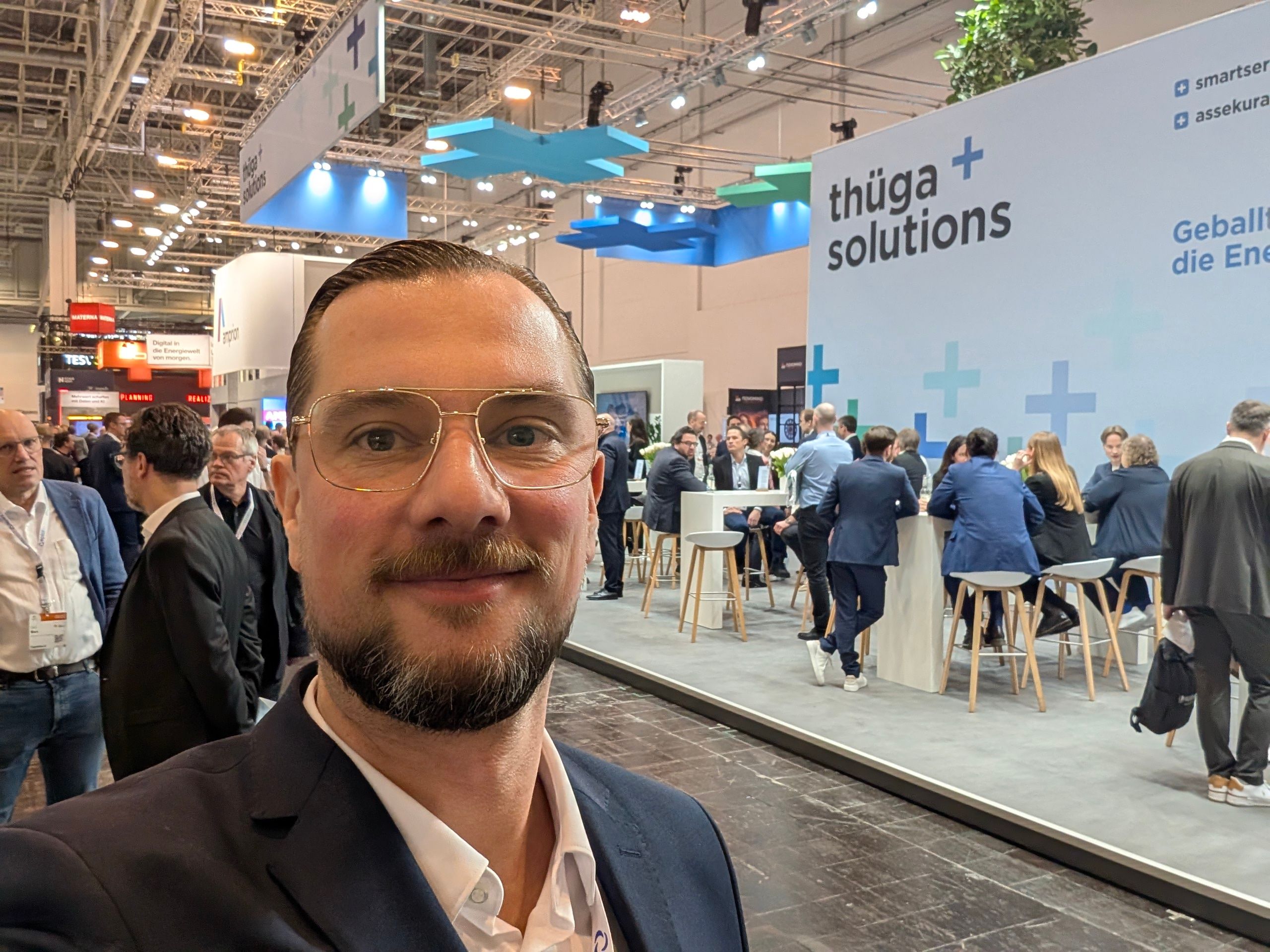 Paul Baptista in a suit at the E-world energy trade fair.